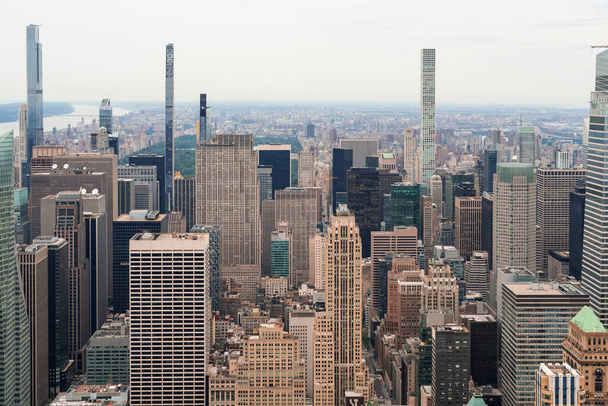 Aerial panoramic city view of Upper Manhattan neighborhoods and the most visited urban park in the United States - Central Park, New York city, USA. Iconic skyscrapers city view of NYC - 写真・画像