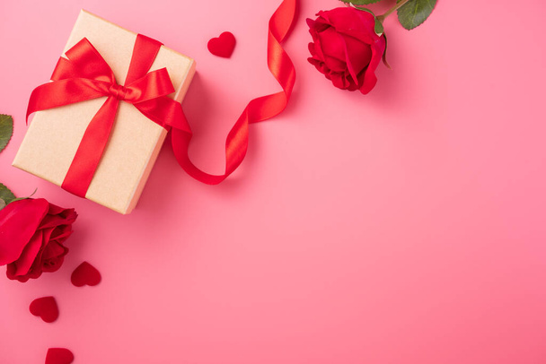 Kraft Gift box with beautful red ribbon and rose, concept of Valentine's, anniversary, mother's day and birthday greeting, copy space, top view. - 写真・画像