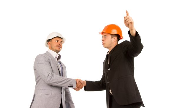 Two Young Angry Male Engineers Shaking Hands - Photo, Image