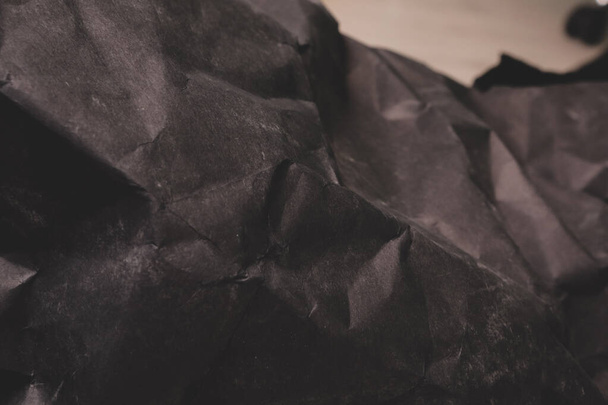 black creased crumpled paper background grunge texture backdrop - Фото, зображення