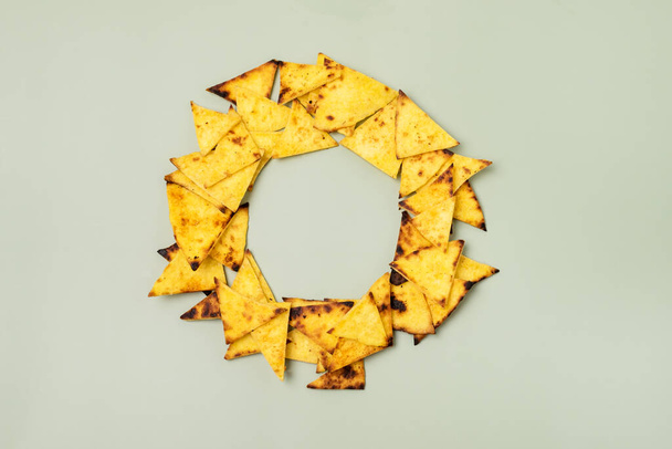 Homemade Chips Tortilla or Nachos on Green Background Top View Horizontal - 写真・画像