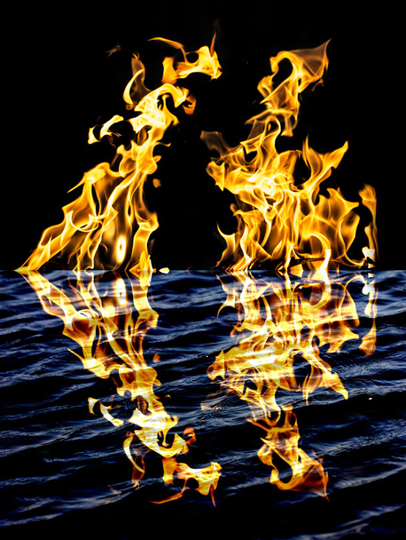 flame fire with reflection in water - Valokuva, kuva
