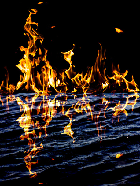 flame fire with reflection in water - Valokuva, kuva