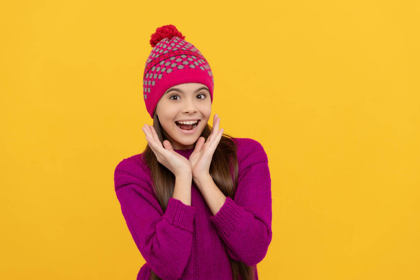 children winter fashion and beauty. teen girl in knitwear. express positive emotion. - Φωτογραφία, εικόνα
