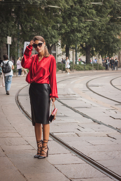 Woman outside Cavalli fashion shows building for Milan Women's Fashion Week 2014 - Zdjęcie, obraz