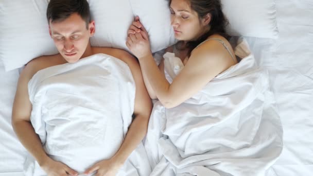 Pregnant woman gets irritated of partner snoring in sleep - Footage, Video