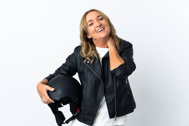 Middle aged biker over isolated white background laughing - Foto, afbeelding