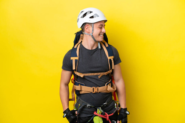 Young rock climber Brazilian man looking side - Photo, image