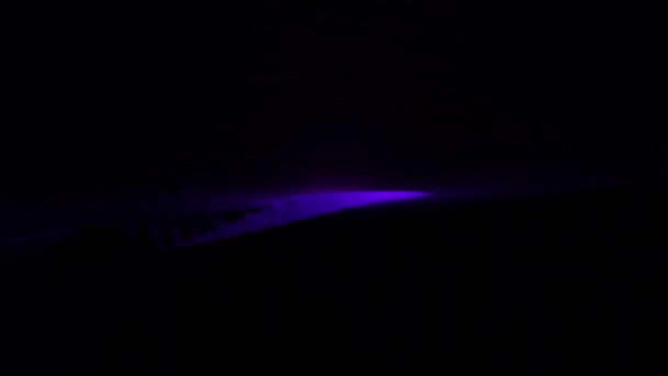 Background.Design. A black background and a comet in purple that falls on the background. - Footage, Video