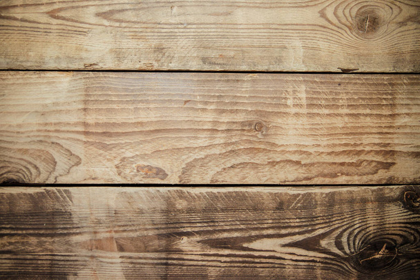 The texture of wood. Natural pattern on a wooden background. Carpentry work. A bench in the park close-up. - Foto, imagen