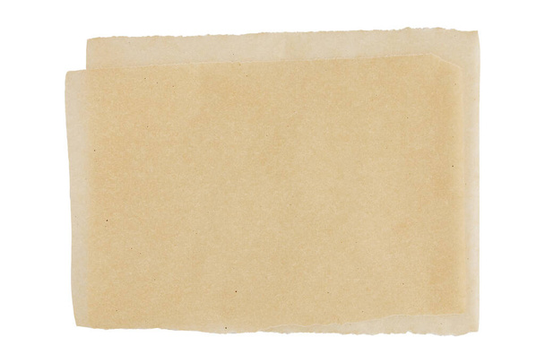 καφέ φύλλο λαδόκολλας μονωμένο σε λευκό φόντο, πάνω όψη, περγαμηνή για ψήσιμο - Φωτογραφία, εικόνα