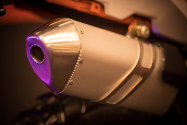 Close up shot of a new motorcycle exhaust pipe. - Photo, image