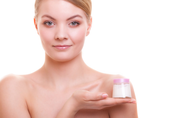 Girl applying moisturizing cream - Fotoğraf, Görsel
