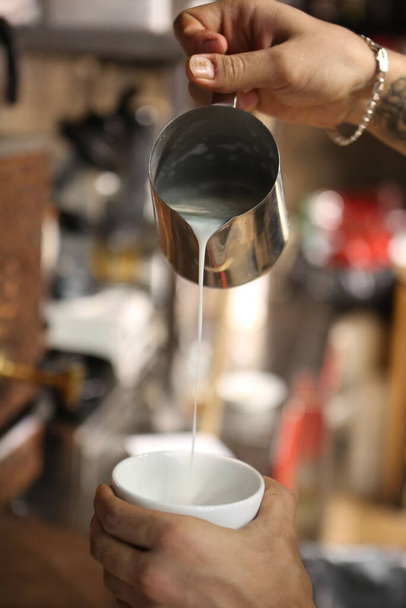 barista brewing coffee in the coffee room - Фото, изображение