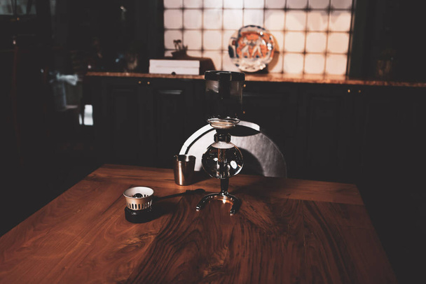 barista brewing coffee in the coffee room - Photo, image
