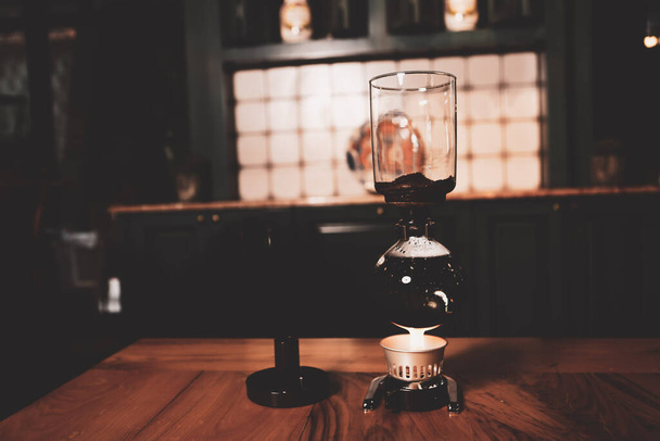 barista brewing coffee in the coffee room - Фото, зображення