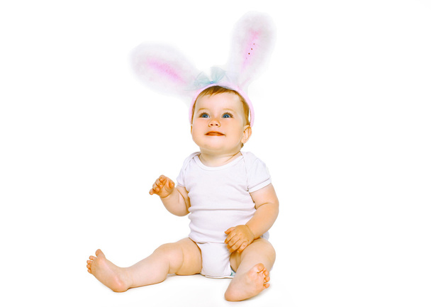 Positive cute baby in costume easter bunny - Foto, immagini