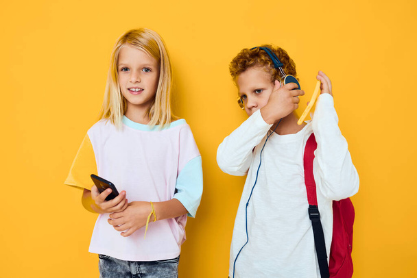 cute kids use gadgets with headphones Studio education concept - Foto, Imagem