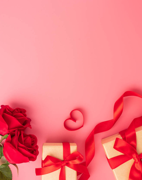 Giving present and celebration concept at Valentine's day, anniversary, mother's day and birthday surprise on pink background, copyspace, topview - Fotoğraf, Görsel