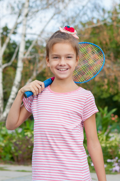 Cute girl with racket Outdoors - Foto, Bild