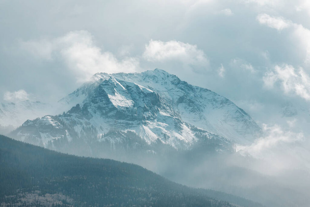 Snow covered mountains in winter season - Fotografie, Obrázek