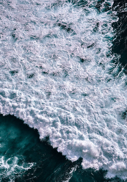 Aerial view to waves in ocean Splashing Waves. Blue clean wavy sea water. - Foto, imagen