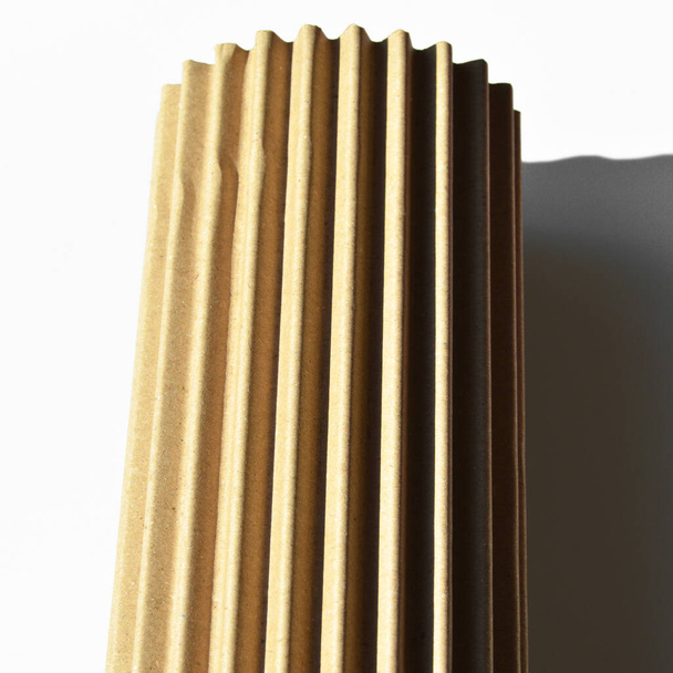 Brown and beige corrugated cardboard, roll cardboard, very suitable for background - Photo, Image