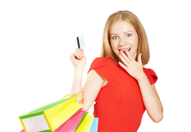 mujer feliz en las compras con bolsas y tarjetas de crédito aisladas en blanco
 - Foto, Imagen