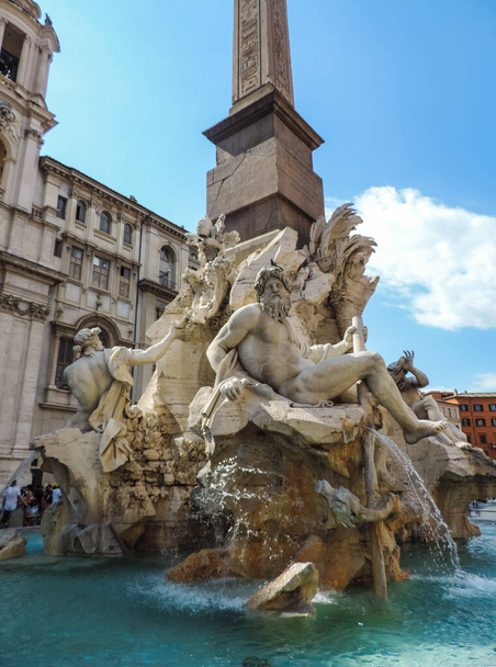 View of Fontana dei Quattro Fiumi (Four Rivers Fountain) at Piazza Navona - Rome, Italy - Фото, зображення