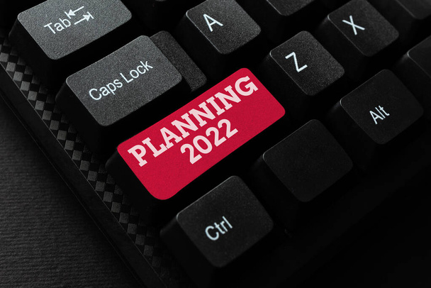 Text showing inspiration Planning 2022. Concept meaning Begin with end in the Mind Positioning Long term Objectives Abstract Transcribing Online Data, Sending And Receiving Emails Globally - Photo, Image