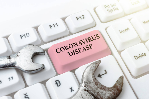 Escribir mostrando texto Enfermedad por Coronavirus. Concepto significado definido como enfermedad causada por un nuevo virus SARSCoV2 Crear una nueva guía de programación, escribir códigos fuente del programa - Foto, imagen