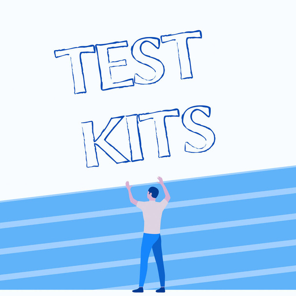 Writing displaying text Test Kits. Conceptual photo tools used to detect the presence of something in the body Athletic Man Standing On Track Field Raising Both Hand Showing Celebration. - Photo, Image