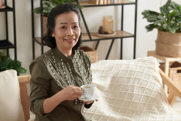 Elegant Senior Woman with Cup of Tea - Фото, изображение