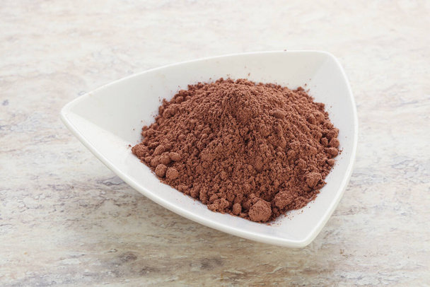 Natuurlijk biologisch aroma cacaopoeder voor culinair gebruik - Foto, afbeelding