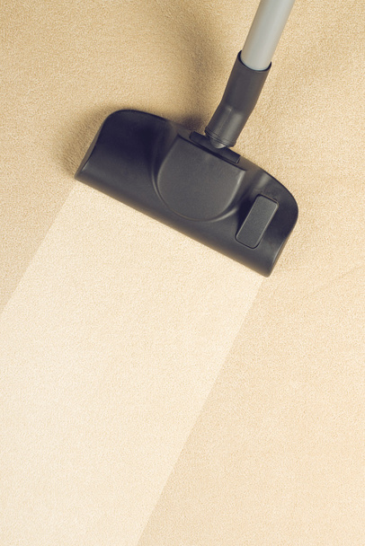 Vacuum Cleaning the New Carpet - Photo, image