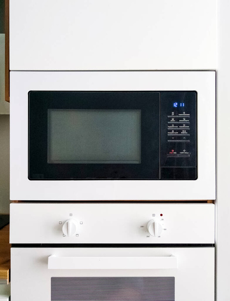White microwave oven in modern scandi kitchen - Foto, Imagem