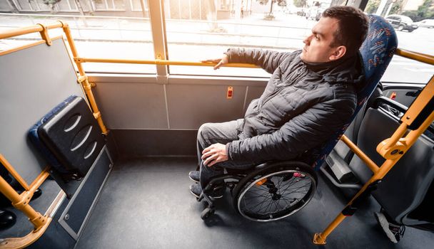 Person with a physical disability inside public transport with an accessible ramp. - Fotografie, Obrázek