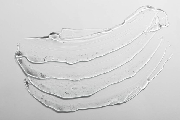 Cosmetic gel on white background, top view - Valokuva, kuva
