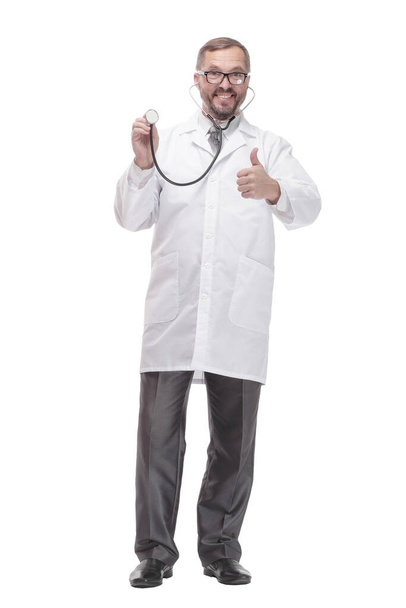 smiling doctor with a stethoscope in his hands - Фото, зображення