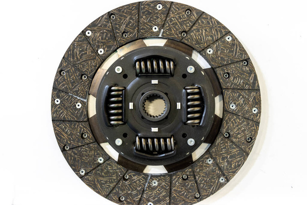 Car clutch plate on isolated white background - Фото, изображение