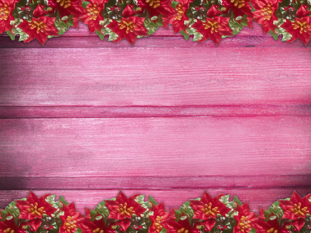 Winter wooden rose pink red cherry nature background with poinsettia two sides. Texture of painted wood horizontal boards. Christmas, New Year card with copy space. Card for congratulation, invitation, party, message for Christmas, New Year. Can be u - Фото, зображення