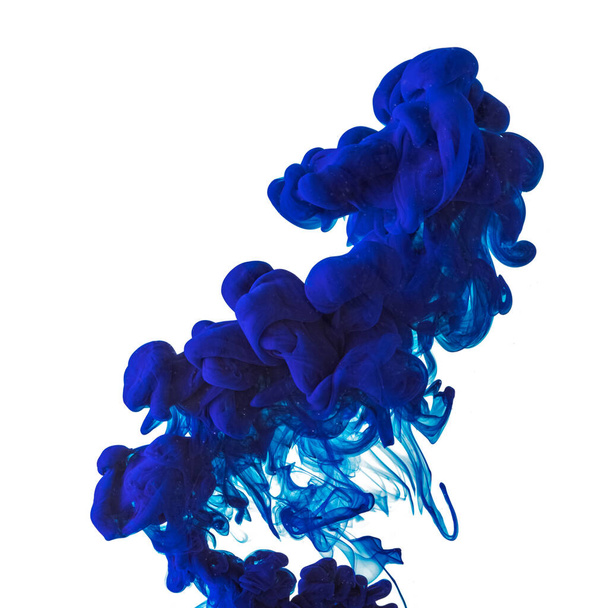 Explosion of colored, fluid and neoned liquids on white studio background with copyspace - Foto, Imagen