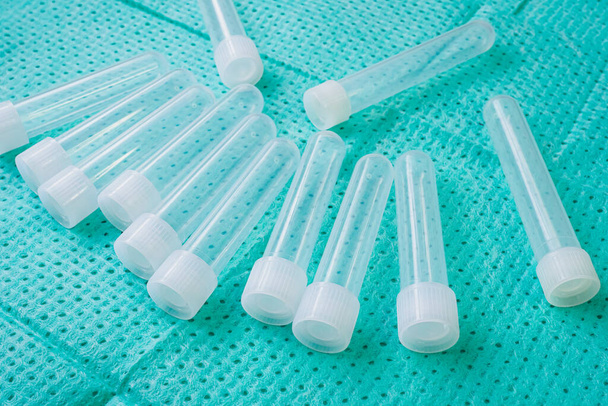 Plastic test tubes with caps for the collection of samples. Sampling tubes for laboratory examination. - Photo, Image