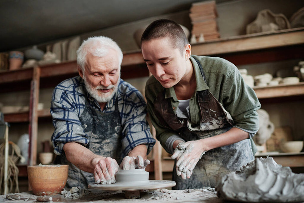 Teamwork on ceramics in studio - Photo, image