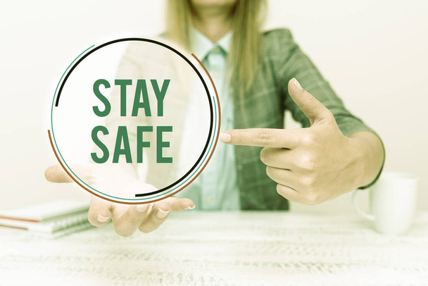 Sign displaying Stay Safe. Business approach secure from threat of danger, harm or place to keep articles Explaining New Business Plans, Orientation And Company Introduction - Foto, Bild