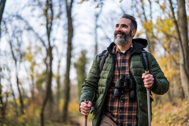 Image of man enjoys hiking in  nature. - Foto, Imagem