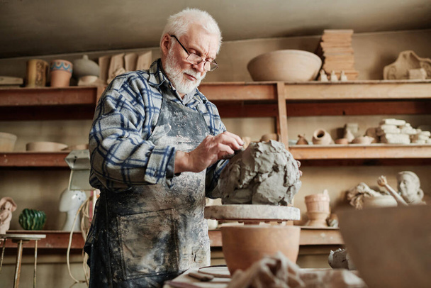 Ceramist making clay vase by hands - Foto, Imagem