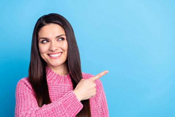Portrait of pretty positive girl look direct finger empty space proposition isolated on blue color background - Φωτογραφία, εικόνα