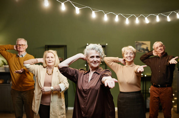 Group of active seniors dancing - Foto, Bild