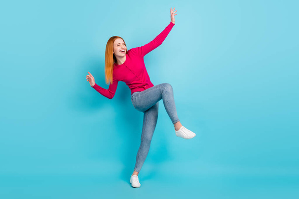 Photo of adorable cute young lady dressed pink outfit smiling dancing isolated blue color background - Fotoğraf, Görsel